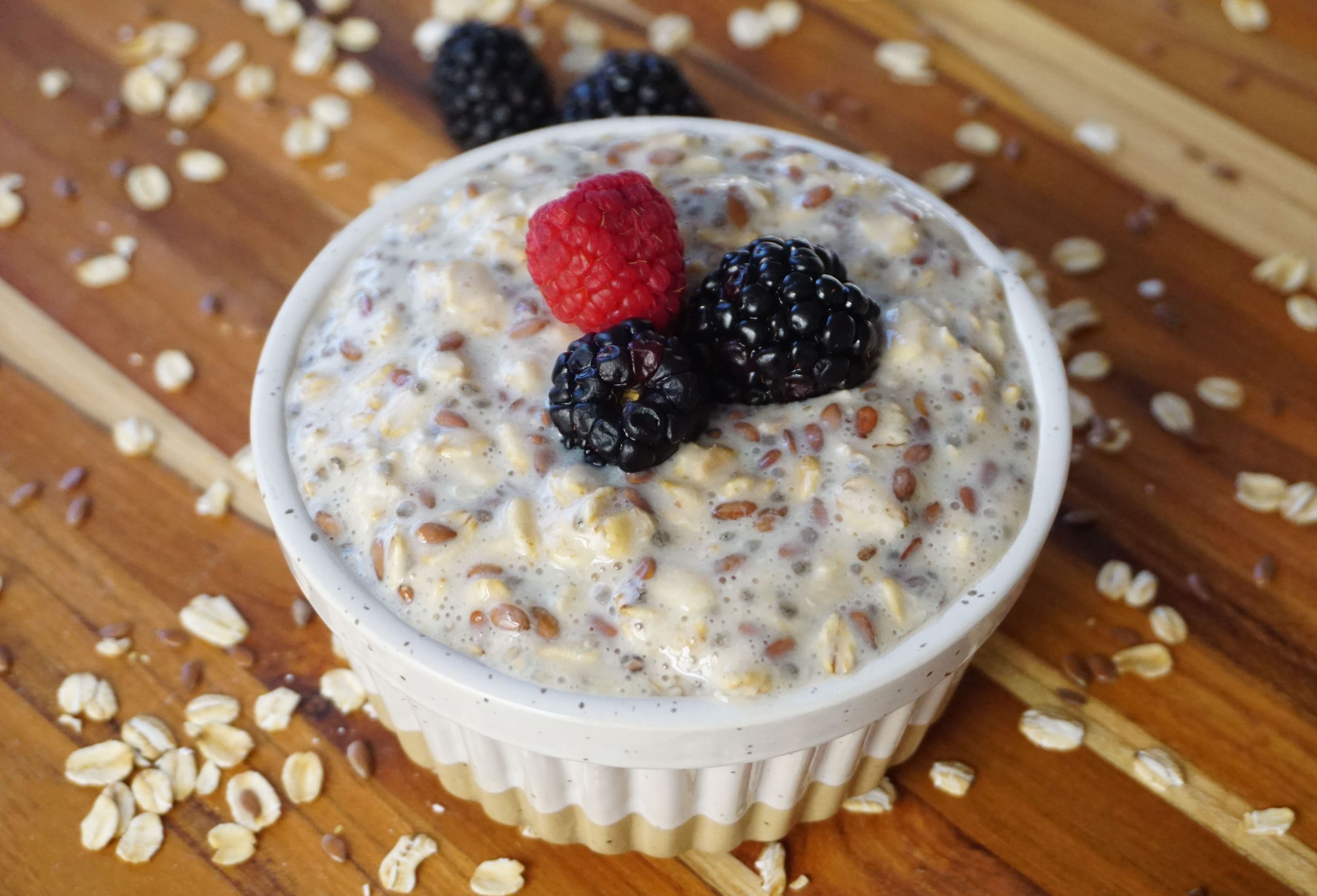 Delicious and healthy oatmeal topped with fresh berries, perfect for a nutritious breakfast.