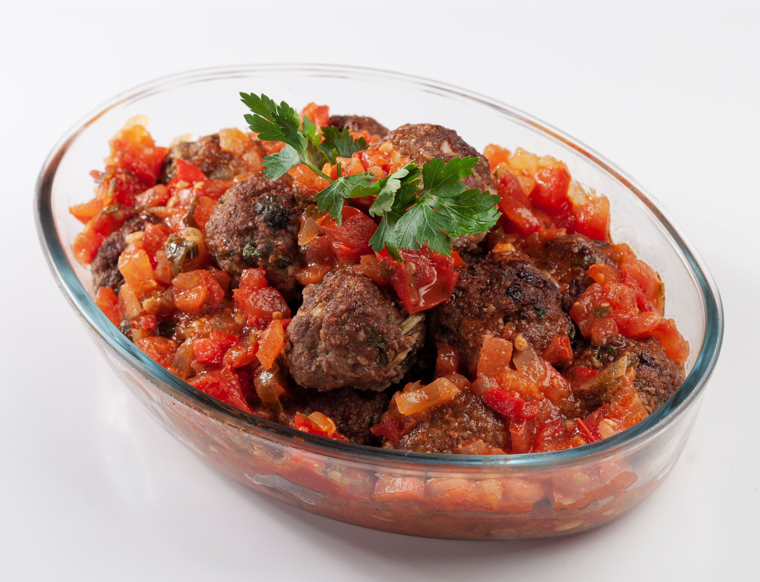 Tasty meatballs garnished with parsley in a vibrant tomato sauce, perfect for any meal.